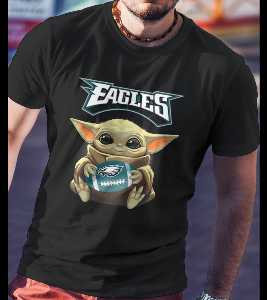 Eagles Philadelphia Baby Yoda Football Holding Eagles Logo Football T-Shirt