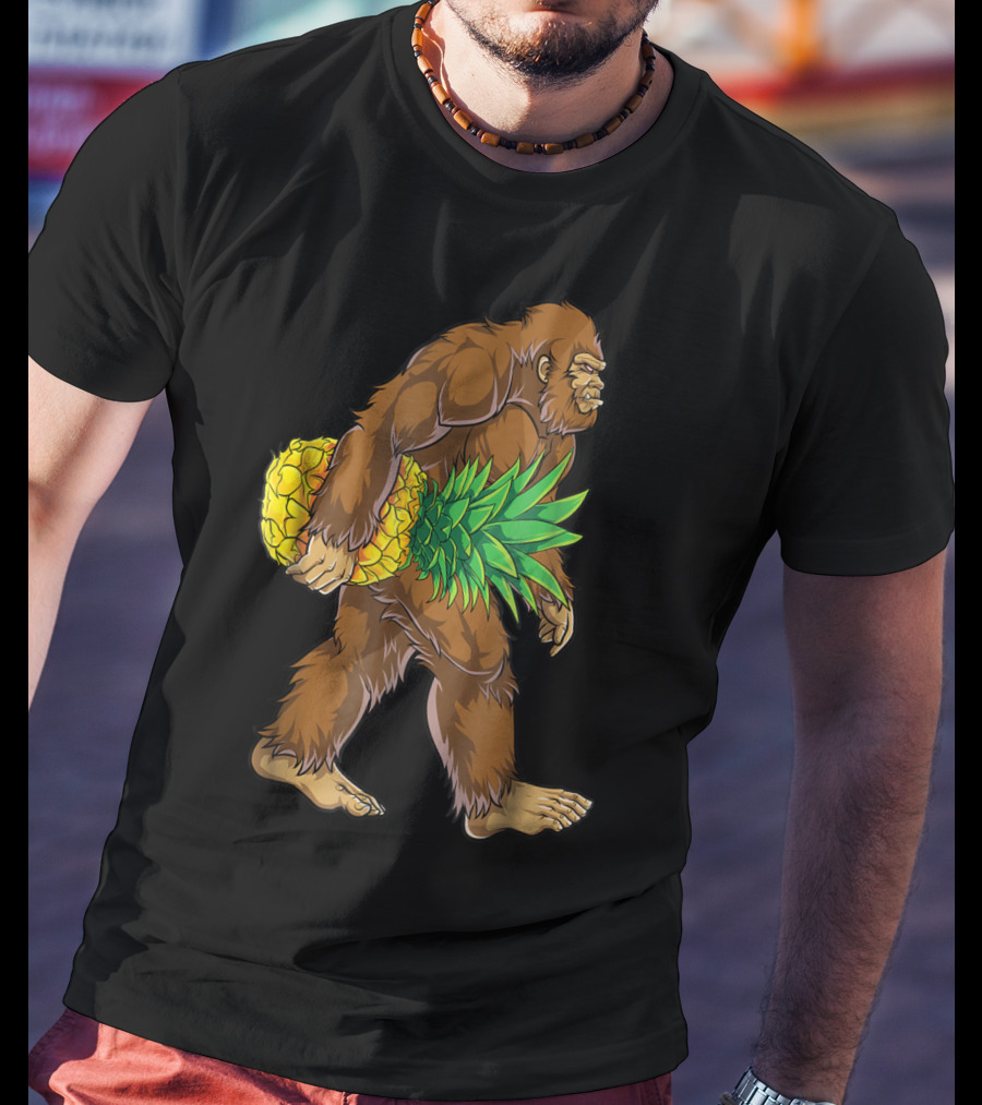 Bigfoot Carrying Pineapple Funny Sasquatch Iconic Creature Humor T-Shirt
