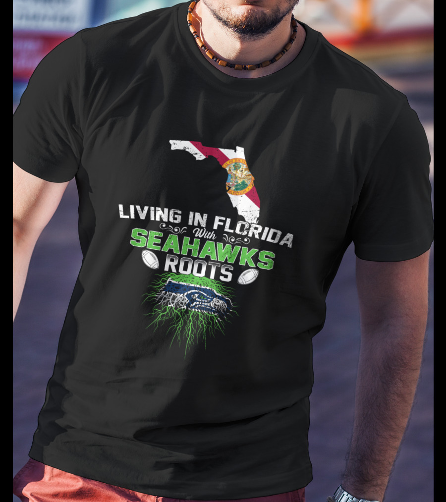 Living In Florida With Seahawks Roots Featuring State Flag And Logo Elements T-Shirt