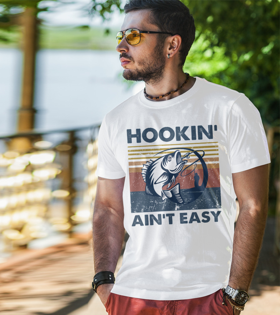 Hookin' Ain't Easy Vintage Fishing Graphic With Striped Sunset And Angler T-Shirt