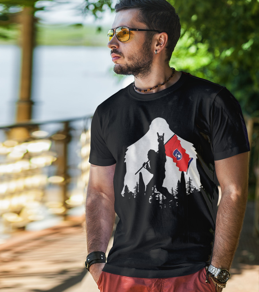 Bigfoot Silhouette With Rock And Roll Pose Holding Tennessee Flag In Forest T-Shirt