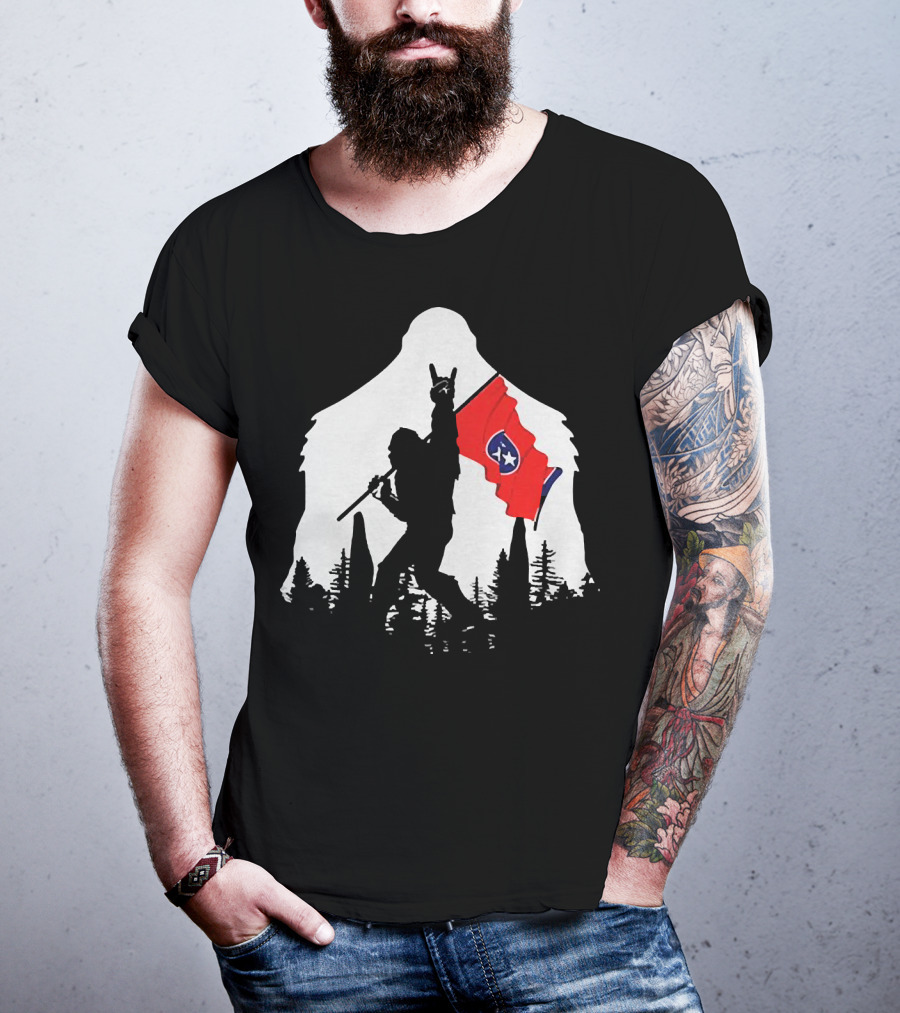 Bigfoot Silhouette With Rock And Roll Pose Holding Tennessee Flag In Forest T-Shirt