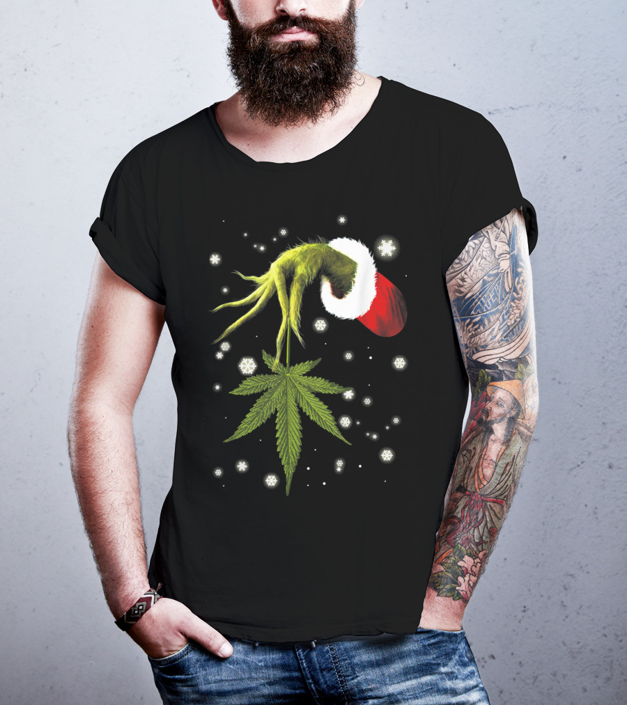 Grinch Hand Holding Cannabis Leaf With Santa Hat And Snowflakes T-Shirt