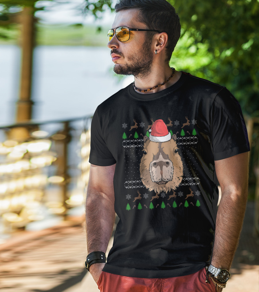 Capybara With Santa Claus Hat In Christmas Theme With Reindeer And Trees T-Shirt