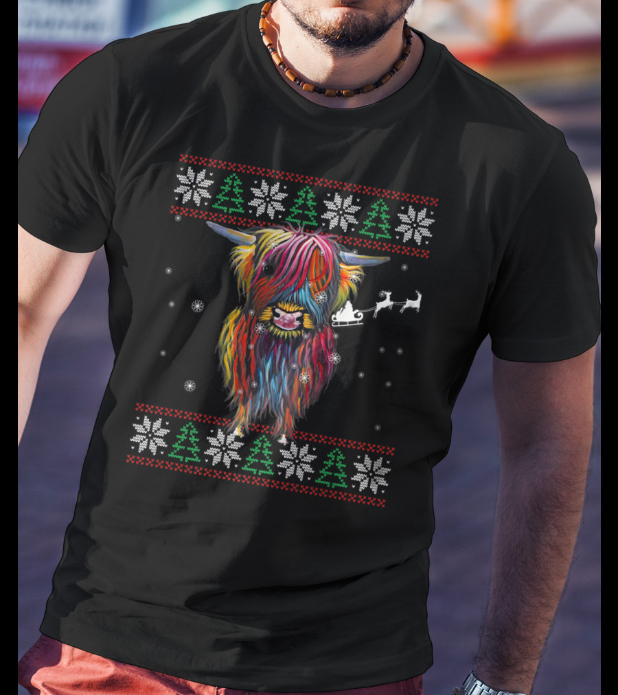 Festive Rainbow Highland Cow With Santa Sleigh And Snowflakes Christmas T-Shirt