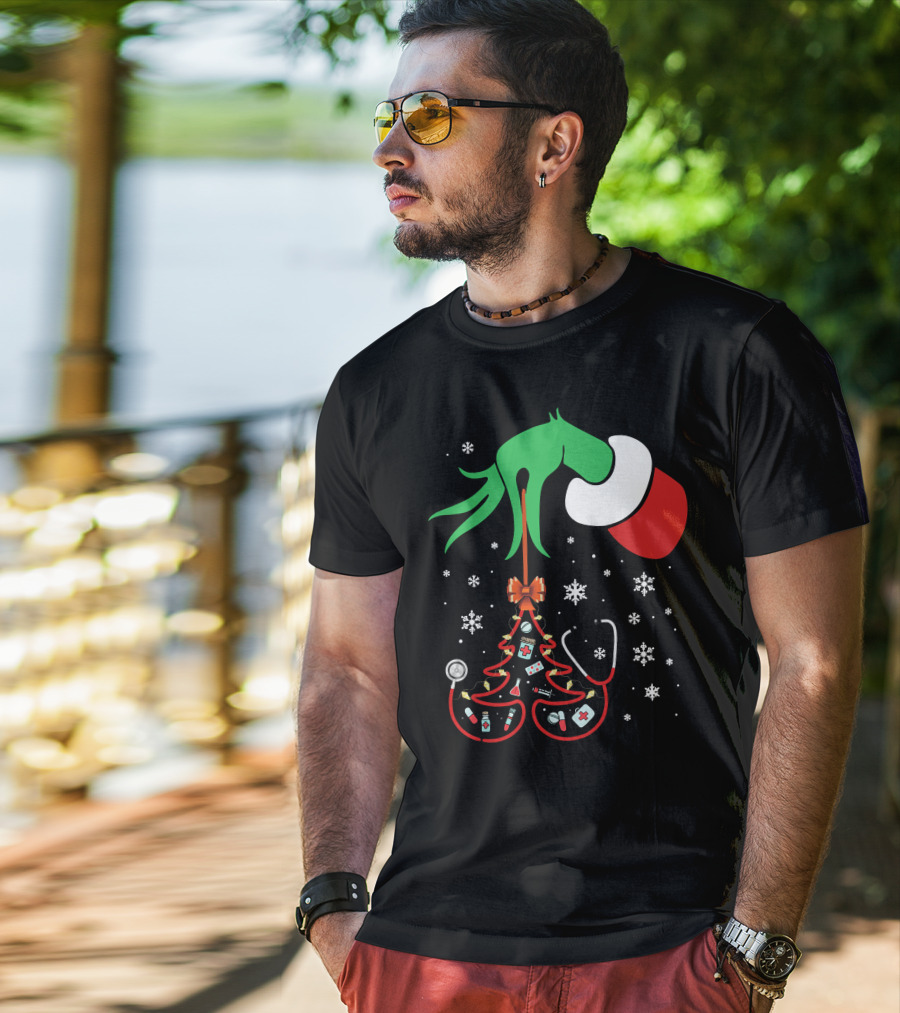 Grinch Hand Holding Nurse Themed Christmas Tree With Medical Icons T-Shirt