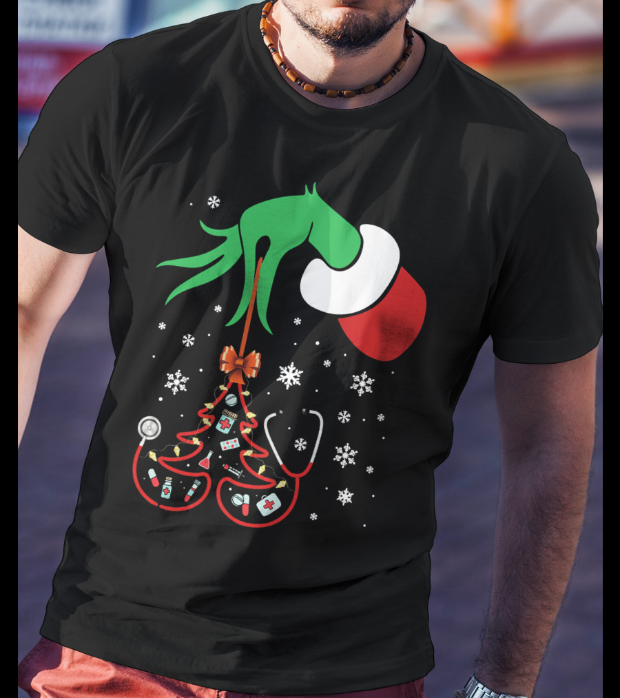 Grinch Hand Holding Nurse Themed Christmas Tree With Medical Icons T-Shirt