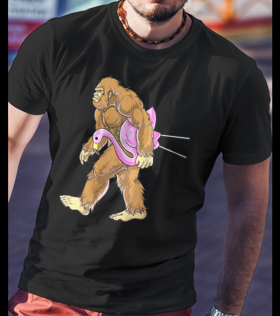 Bigfoot Carrying Pink Lawn Flamingo Humorous Sasquatch Image T-Shirt