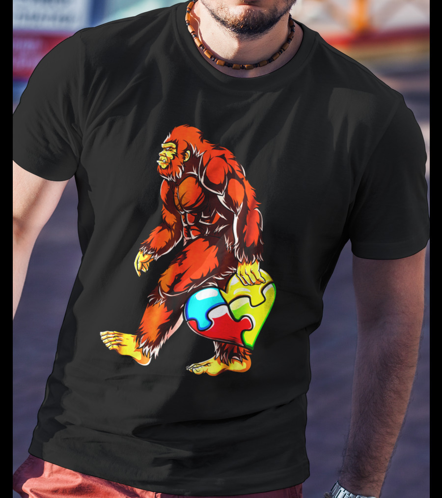 Bigfoot Holding Heart-Shaped Puzzle Piece For Autism Awareness T-Shirt
