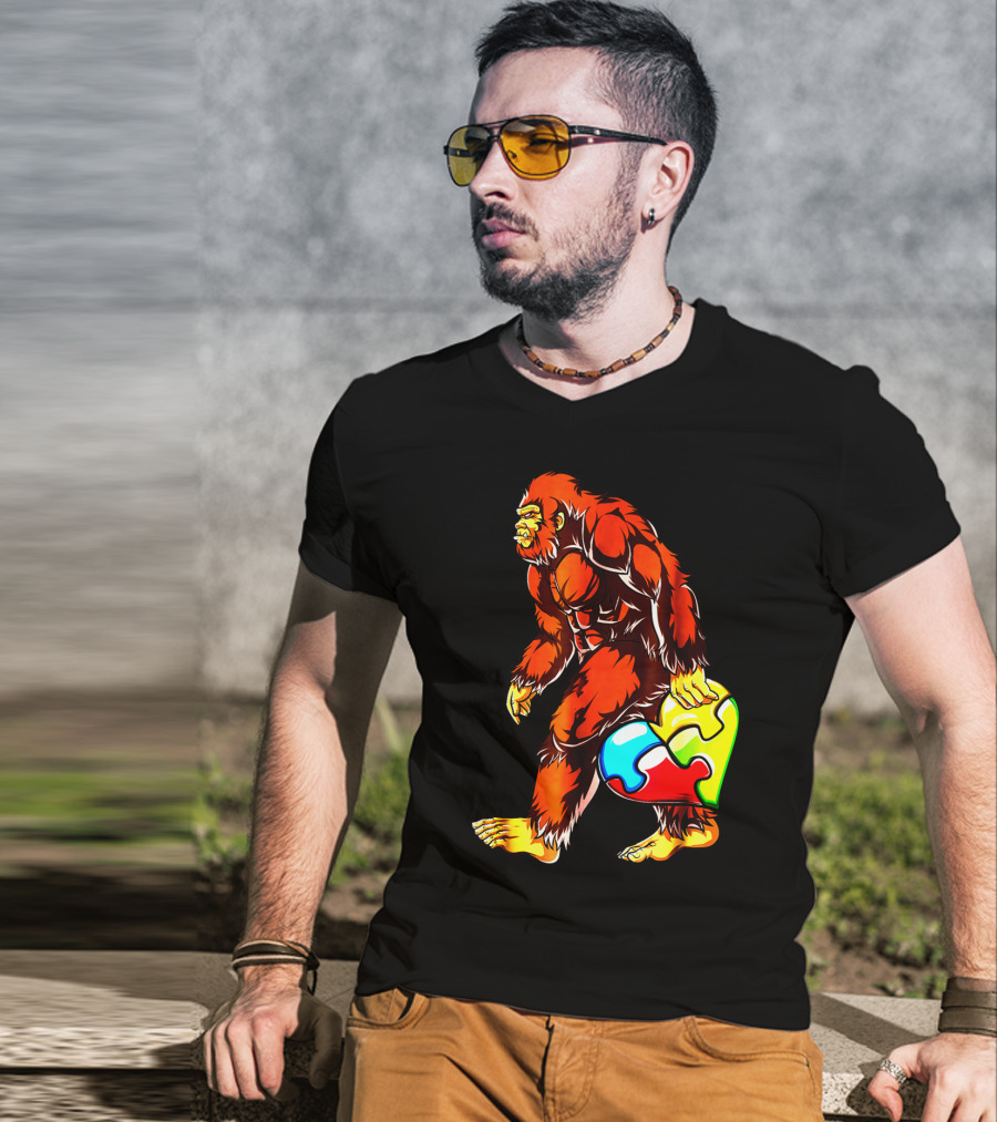 Bigfoot Holding Heart-Shaped Puzzle Piece For Autism Awareness T-Shirt