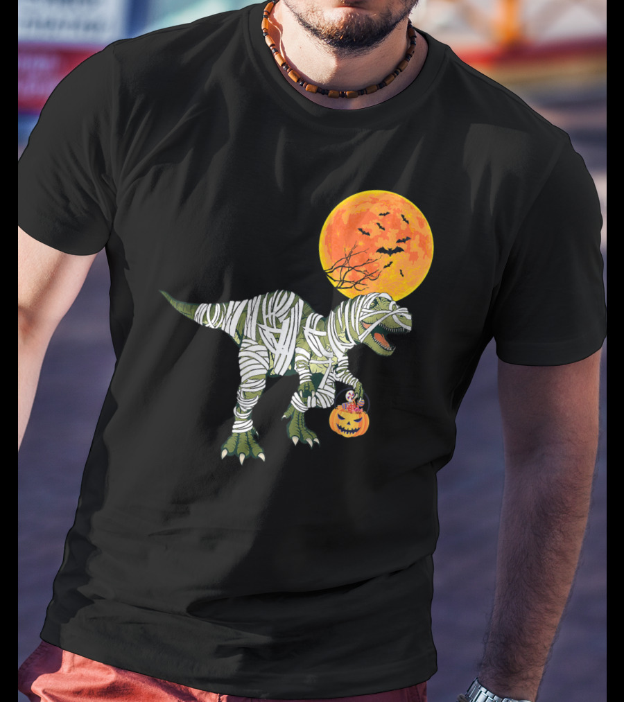 Dinosaur Halloween Mummy With Pumpkin And Full Moon Background T-Shirt