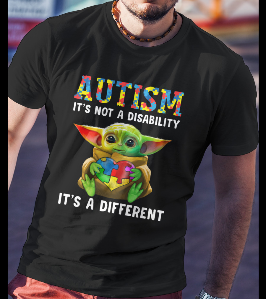 AUTISM IT'S NOT A DISABILITY IT'S A DIFFERENT Baby Yoda Holding Puzzle Piece T-Shirt