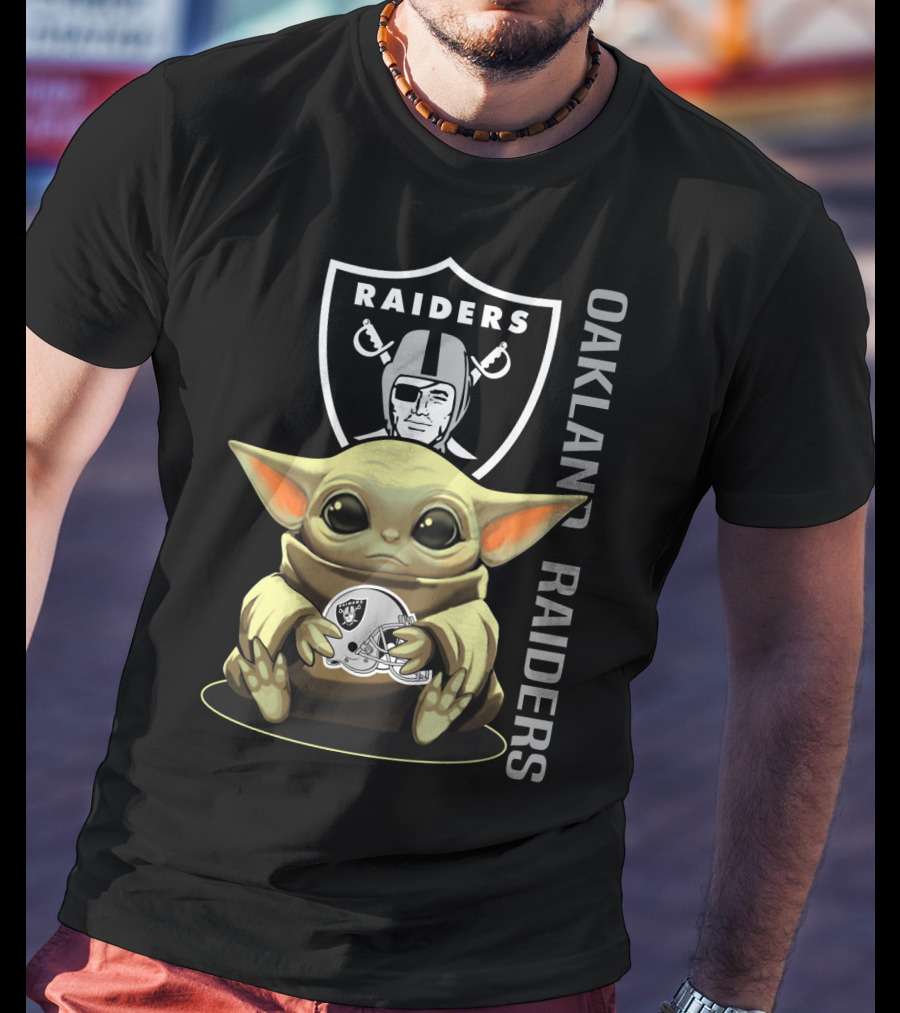 Baby Yoda Holding Oakland Raiders Helmet With Raiders Logo In Background T-Shirt
