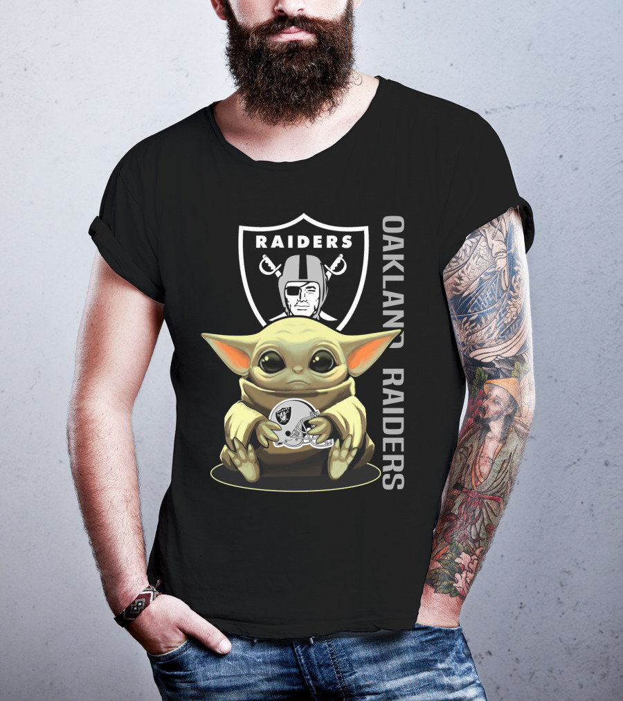 Baby Yoda Holding Oakland Raiders Helmet With Raiders Logo In Background T-Shirt
