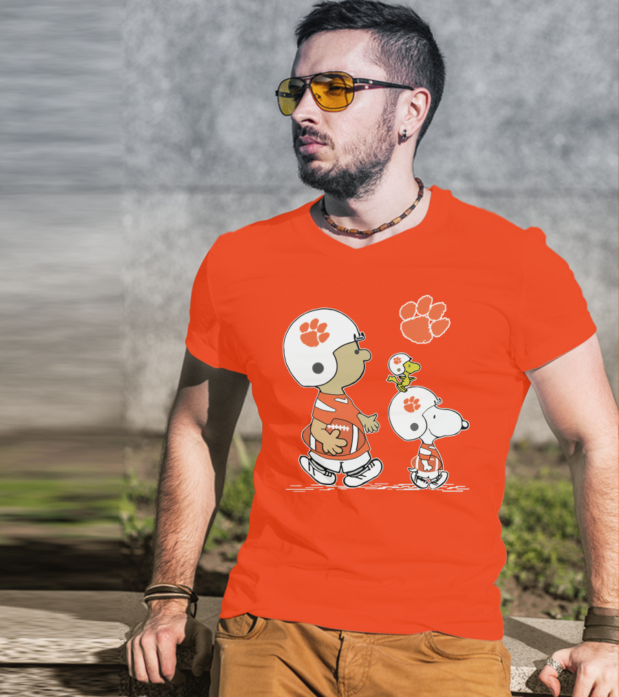 Clemson Tigers Snoopy Football Helmets And Paw Print Charlie Brown Woodstock T-Shirt