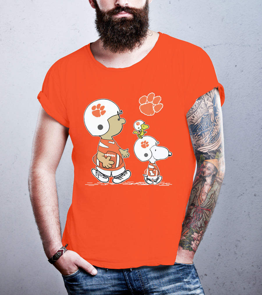 Clemson Tigers Snoopy Football Helmets And Paw Print Charlie Brown Woodstock T-Shirt