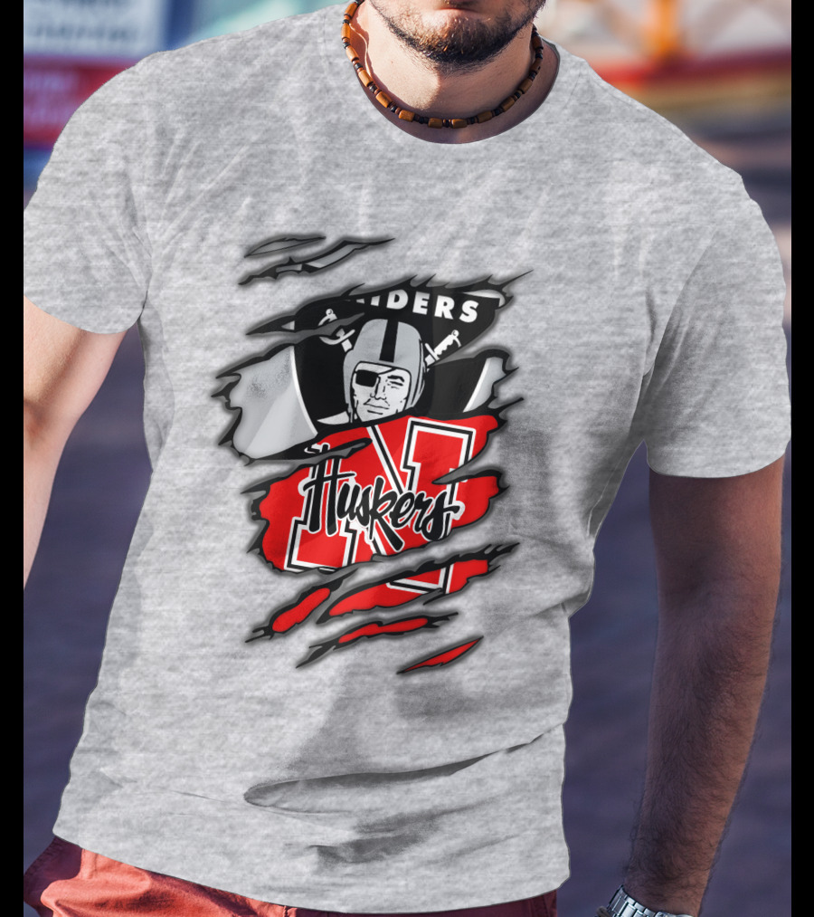 Raiders Huskers Torn Design With Icons And Symbols T-Shirt