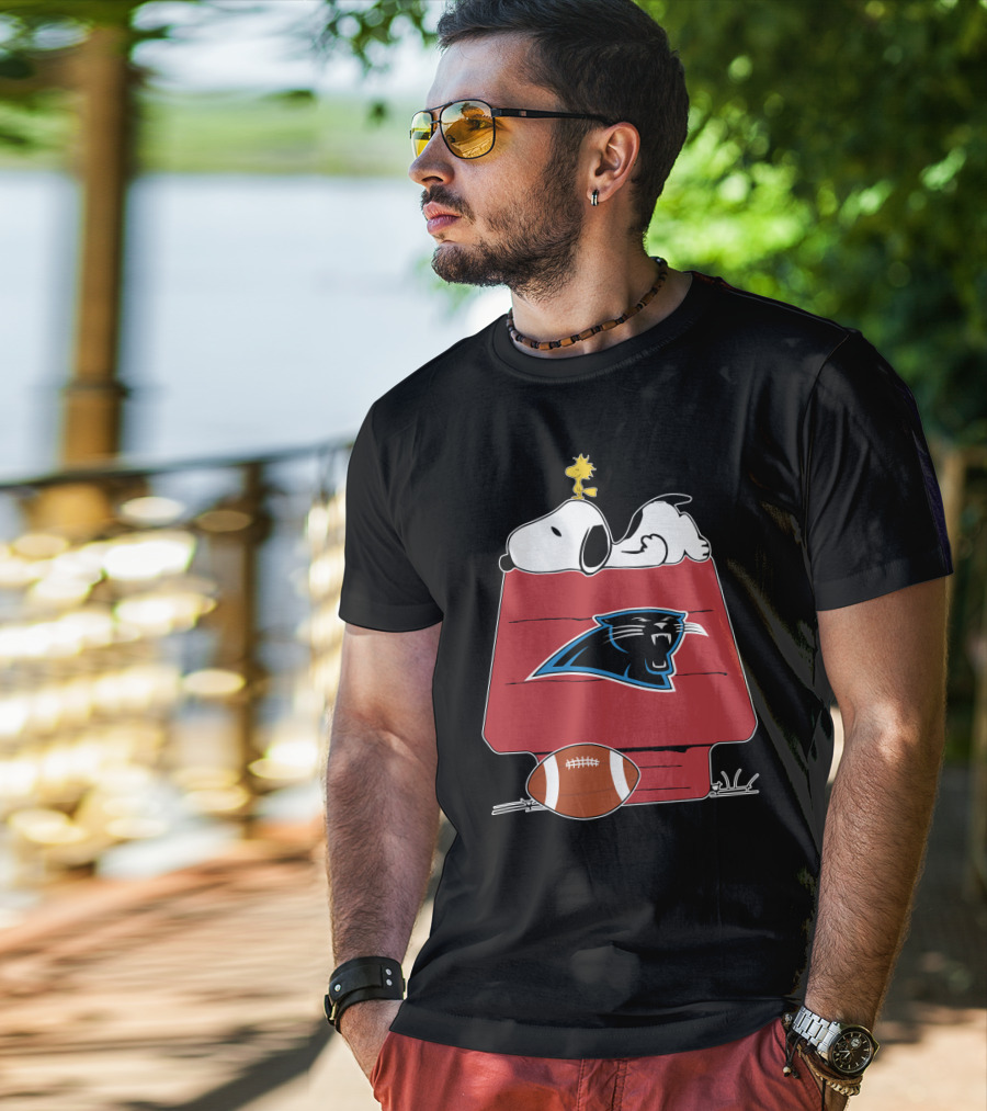 Snoopy And Woodstock On Doghouse With Carolina Panthers Logo And Football T-Shirt