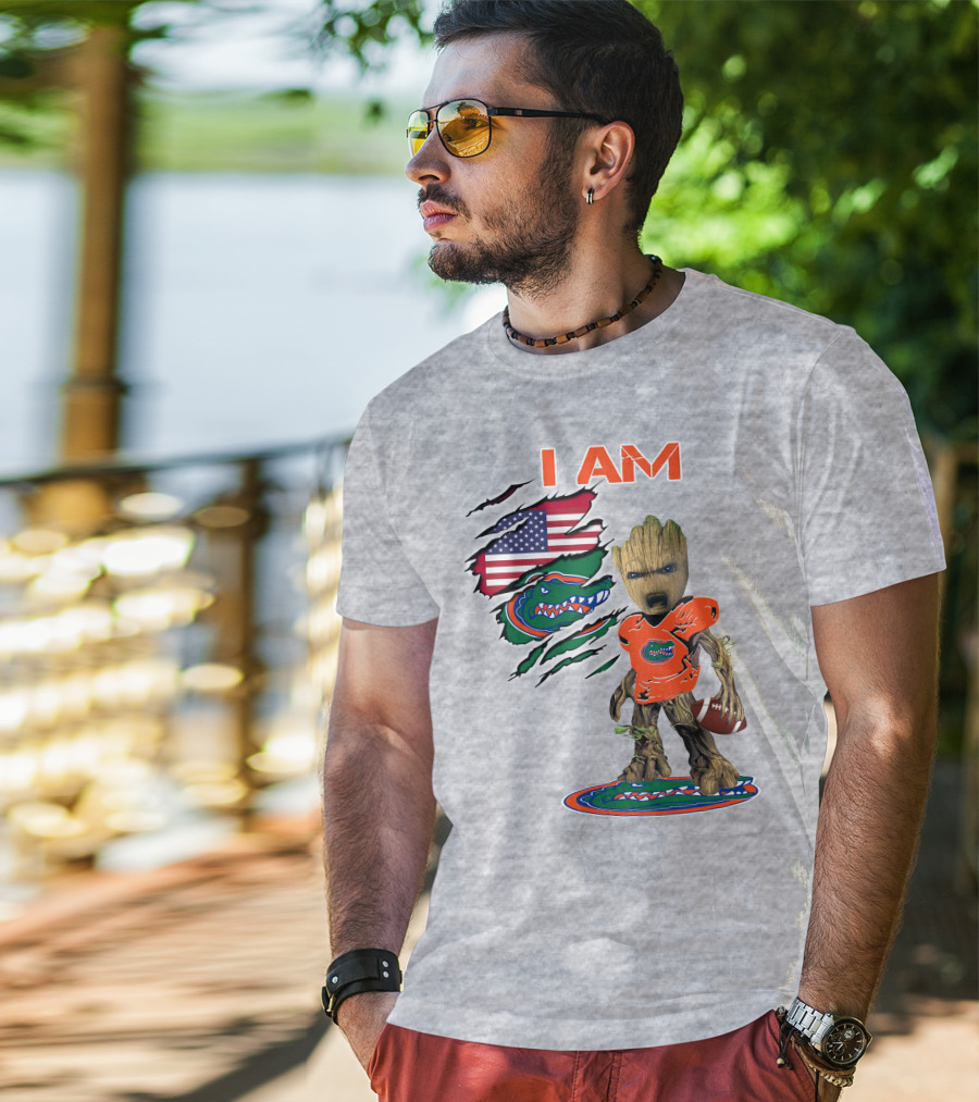 I Am Gators Baby Groot Holding Football With American Flag And Florida Gators T-Shirt
