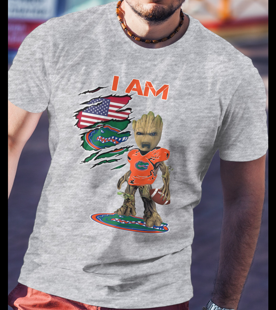 I Am Gators Baby Groot Holding Football With American Flag And Florida Gators T-Shirt