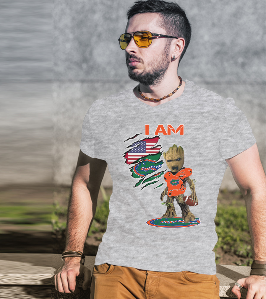 I Am Gators Baby Groot Holding Football With American Flag And Florida Gators T-Shirt