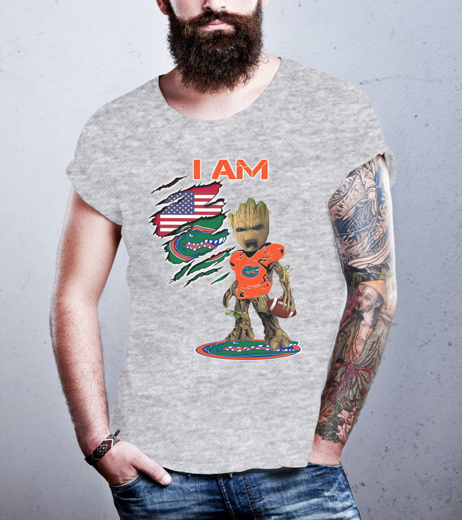 I Am Gators Baby Groot Holding Football With American Flag And Florida Gators T-Shirt