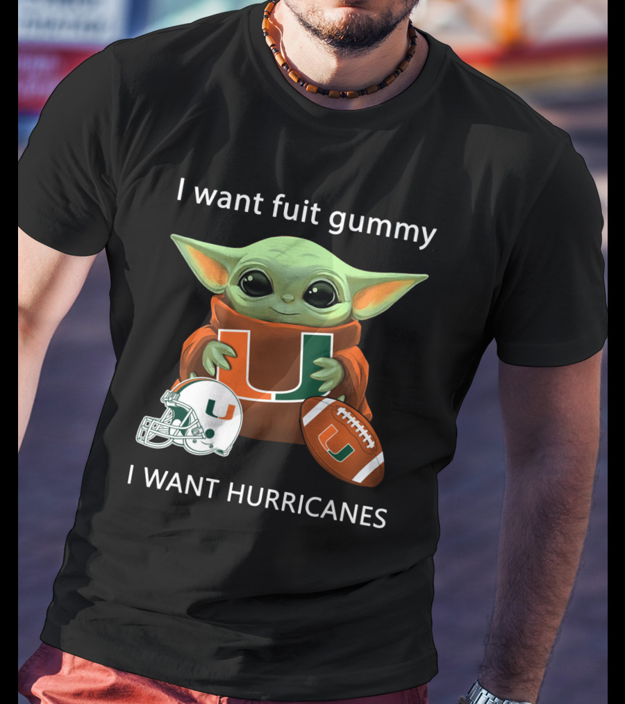 I Want Fuit Gummy I Want Hurricanes Baby Yoda Holding Miami Hurricanes Logo Helmet And Football T-Shirt