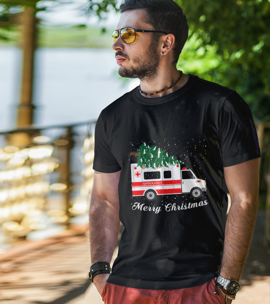 Merry Christmas Ambulance Carrying Christmas Tree In Snowfall T-Shirt