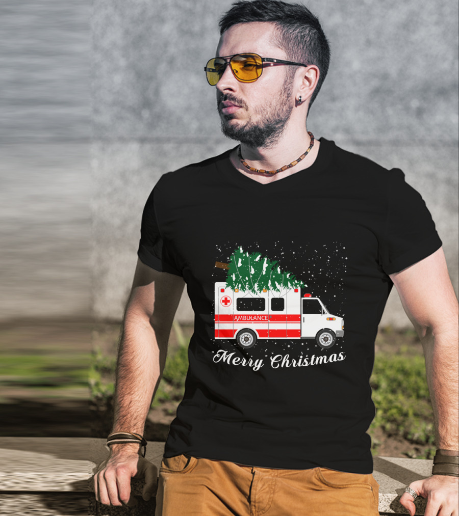 Merry Christmas Ambulance Carrying Christmas Tree In Snowfall T-Shirt