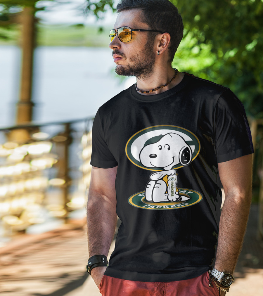 Snoopy Holding Green Bay Packers Logo Football Jerseys T-Shirt