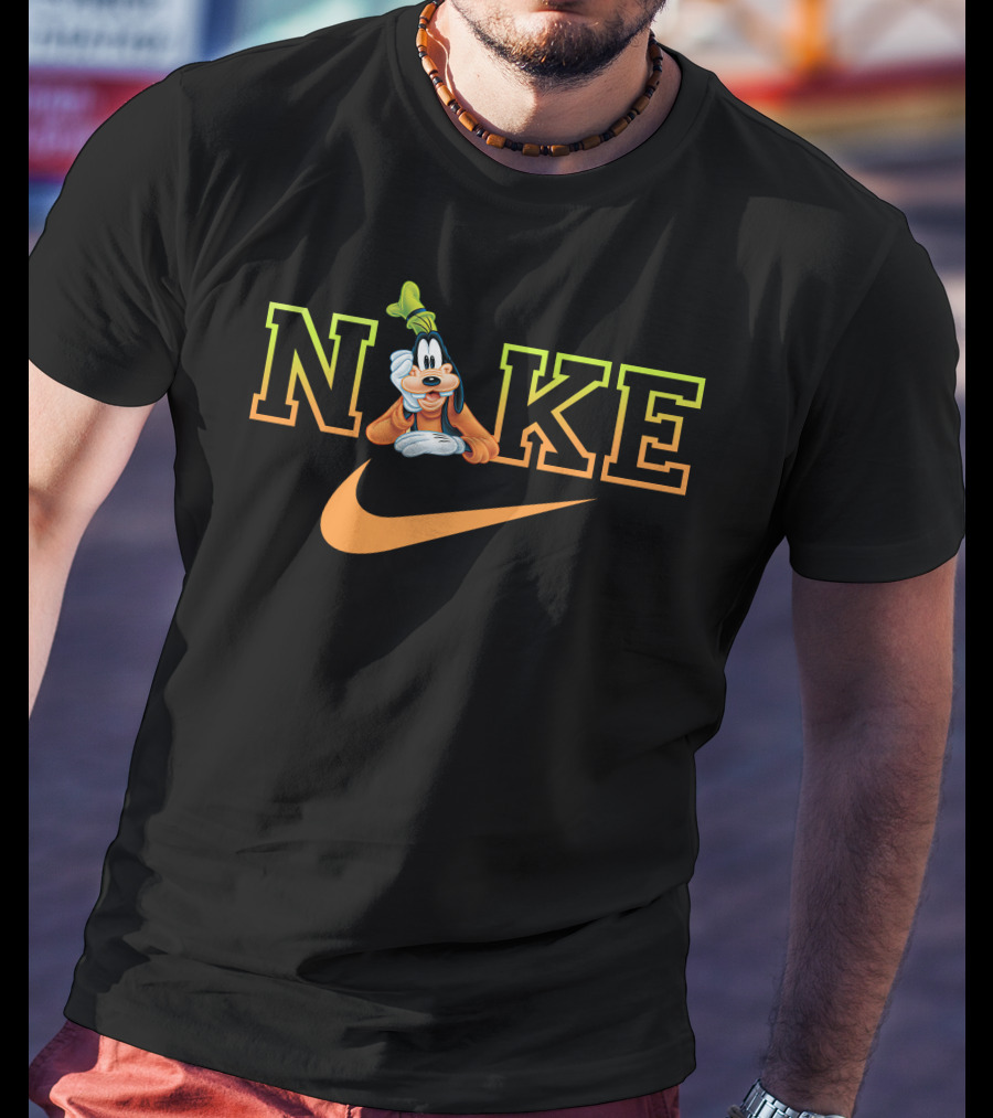 Goofy Nike With Orange Swoosh Logo And Green Hat T-Shirt