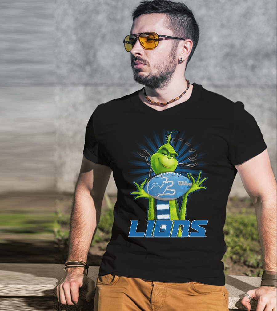 Grinch Holding Detroit Lions Wilson Football T-Shirt
