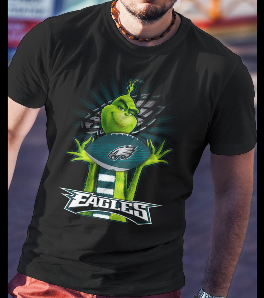 Grinch Holding Philadelphia Eagles Football With Team T-Shirt