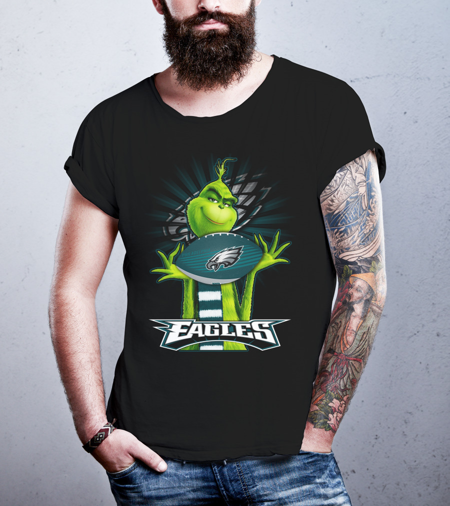 Grinch Holding Philadelphia Eagles Football With Team T-Shirt