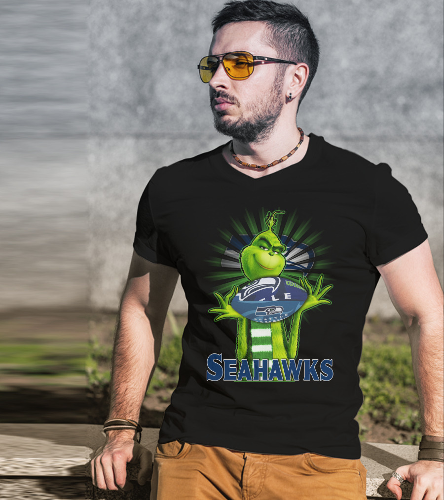 Grinch Holding Seattle Seahawks Football T-Shirt