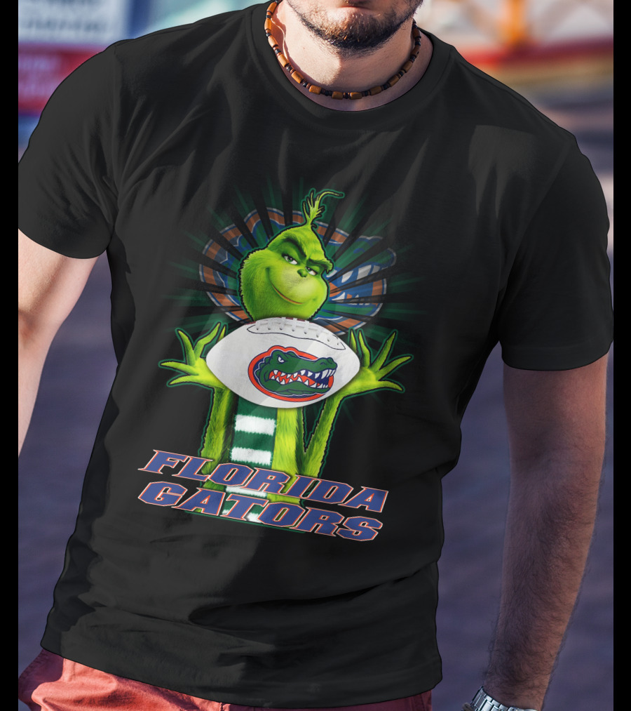 Grinch Holding Florida Gators Football T-Shirt