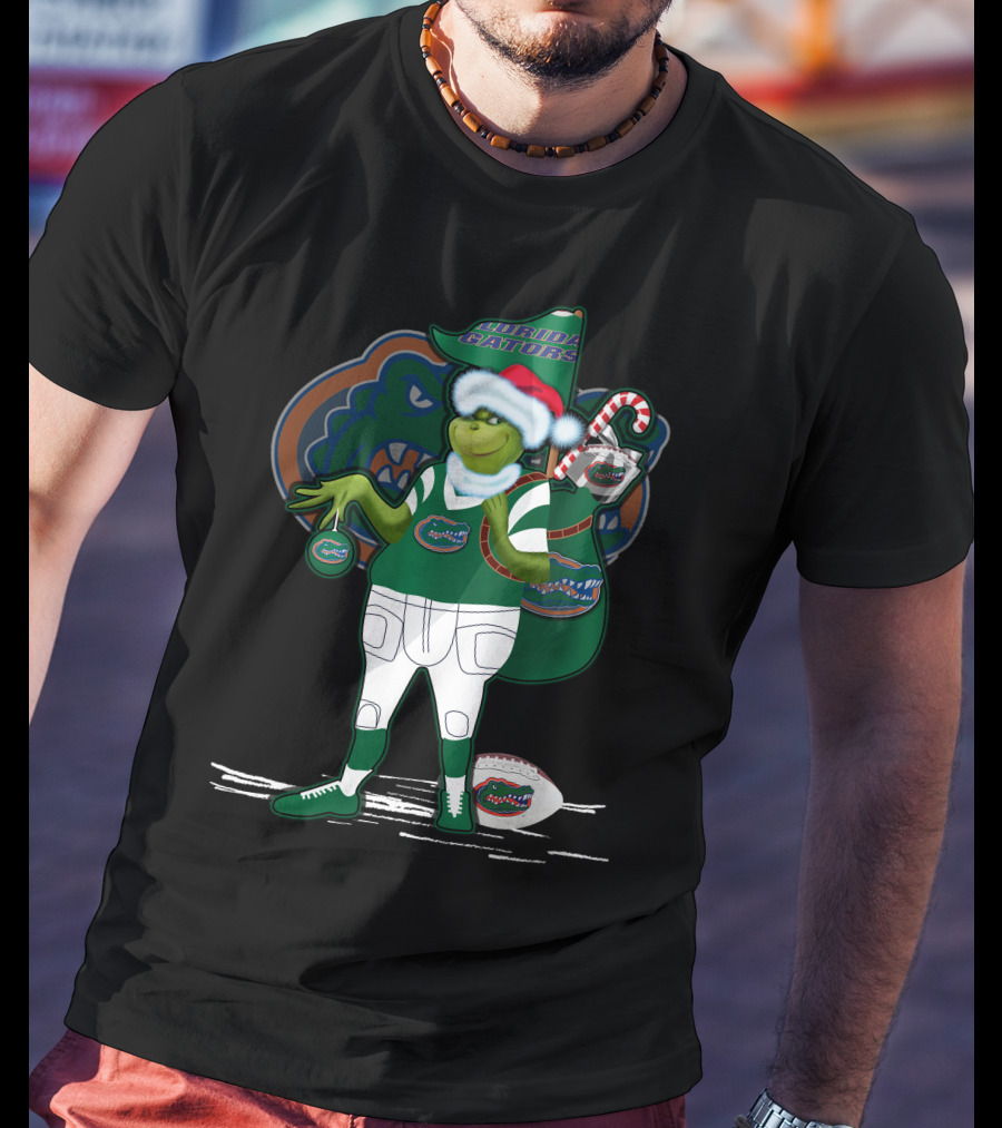 Grinchxmas Wearing Santa Hat Florida Gators With Gator Logo And Candy Cane T-Shirt