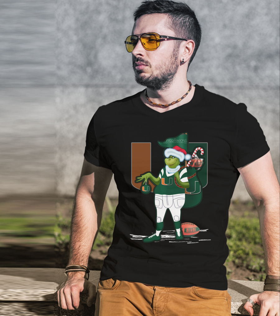 Grinchxmas Miami Hurricanes Festive Football Santa Grinch With Logo And Candy Cane Sack T-Shirt