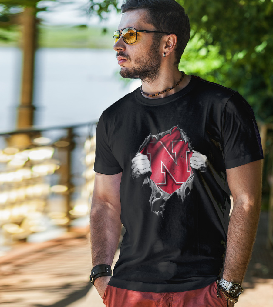 Torn Nebraska Huskers Bold N Emblem Peeking Through Ripped T-Shirt