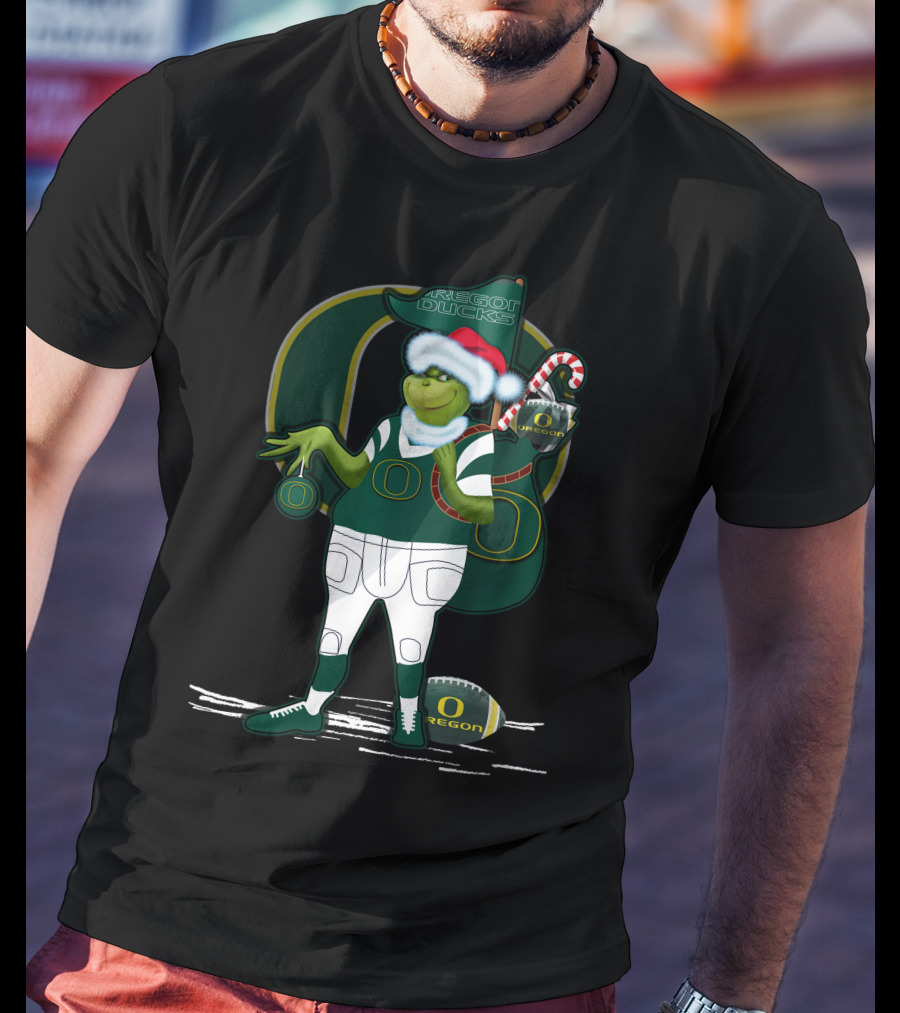 Oregon Ducks Grinch Santa With Candy Cane And Football T-Shirt