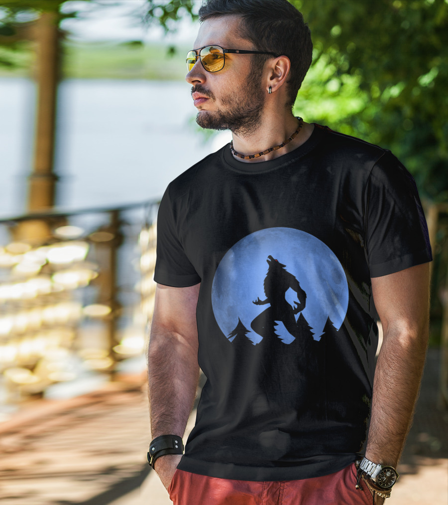 Werewolf Silhouette Howling At Full Blue Moon With Forest Background T-Shirt
