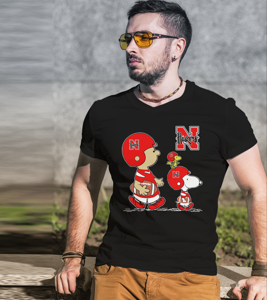 Nebraska Cornhuskers Peanuts Charlie Brown And Snoopy Football Helmets T-Shirt