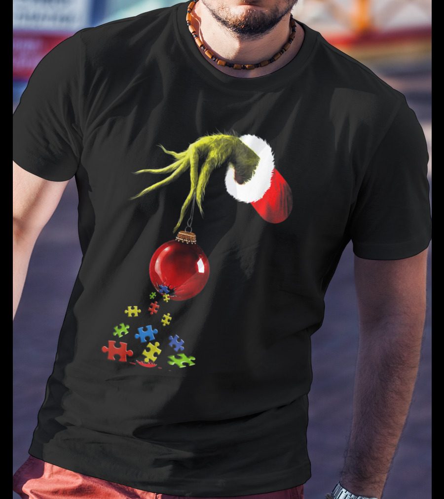 Grinch Hand Holding Red Ornament With Autism Puzzle Pieces T-Shirt