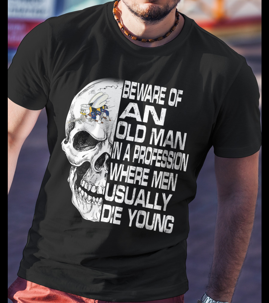 Beware Of An Old Man In A Profession Where Men Usually Die Young Skull With Cap And Glasses T-Shirt