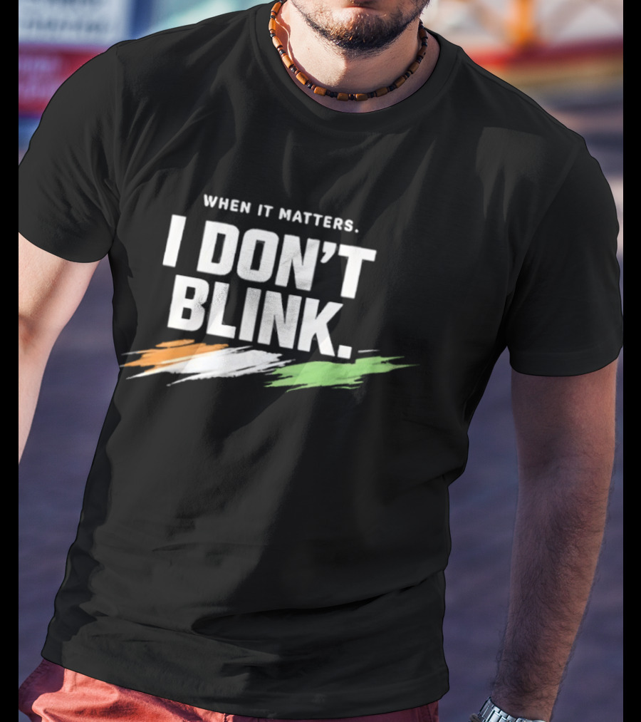 When It Matters I Don't Blink Bold Text With Orange White Green Brush Strokes T-Shirt