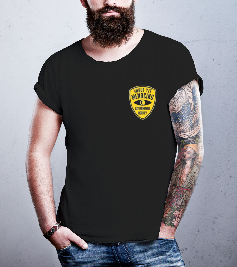 Vague Yet Menacing Government Agency Yellow Badge With Eye T-Shirt