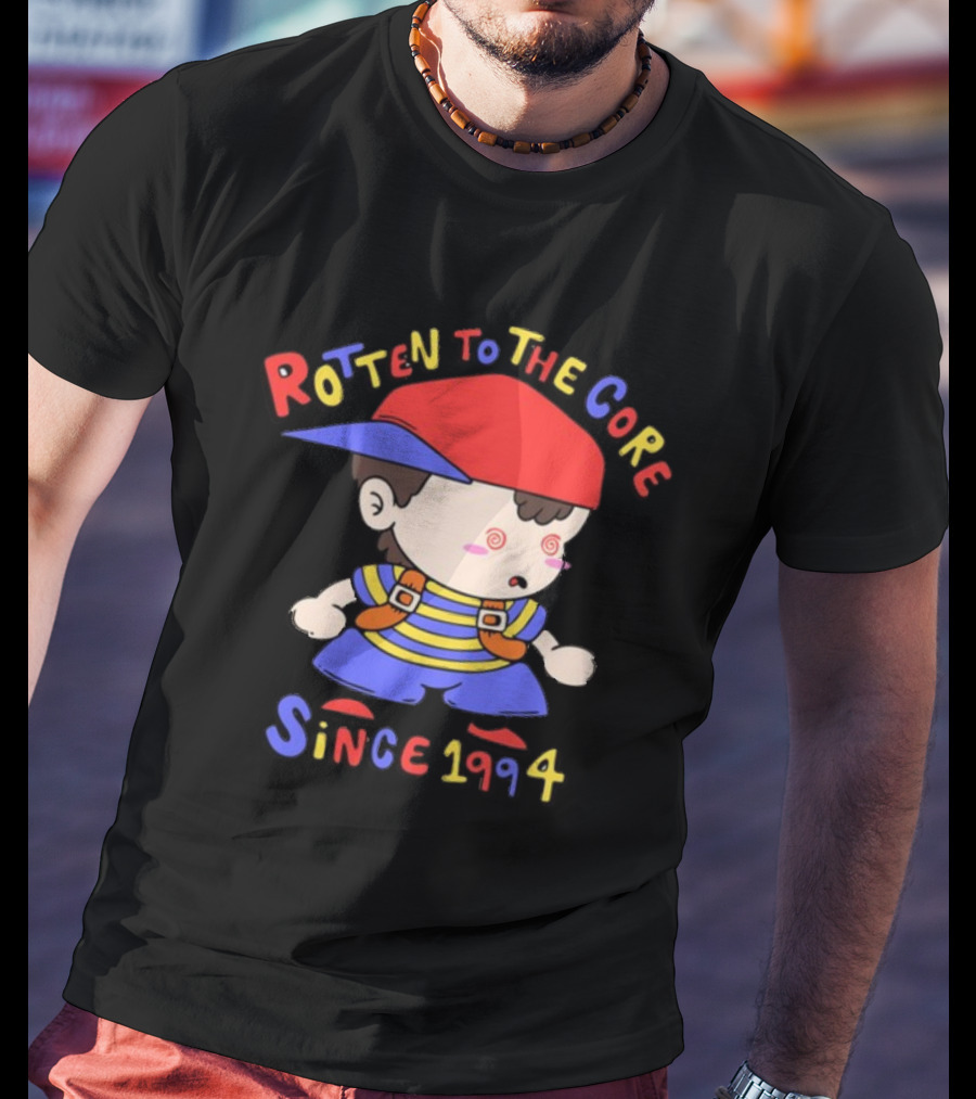 Rotten To The Core Since 1994 Cartoon Character With Red Cap And Striped T-Shirt