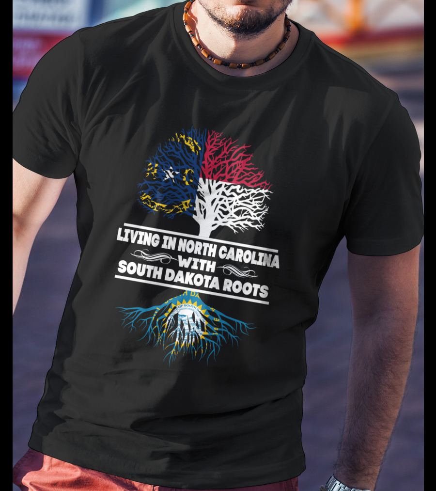 Living In North Carolina With South Dakota Heritage Roots Featuring State Flags And Tree Symbolism T-Shirt