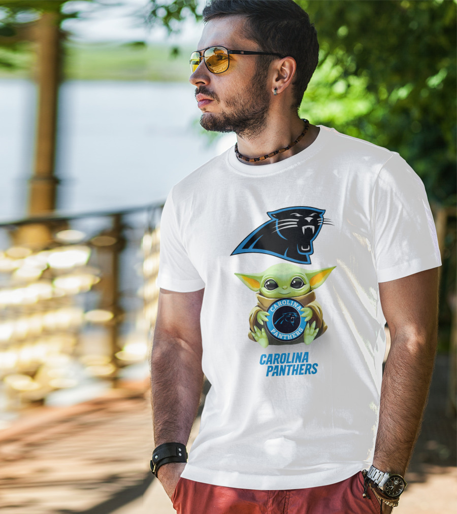 Grogu Holding Carolina Panthers Emblem With Team Logo In White T-Shirt