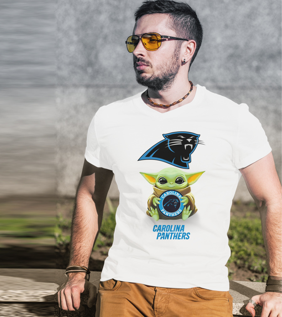 Grogu Holding Carolina Panthers Emblem With Team Logo In White T-Shirt